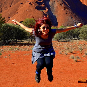 Bachelor of Arts graduate leaps in the air at Uluru