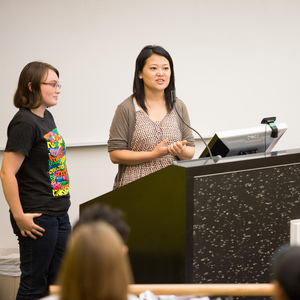 UNE student speaks at lecturn