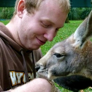 UNE graduate feeds kangaroo